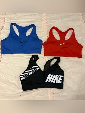 Nike Three-Pack Sports Bras in Blue, Red & Black